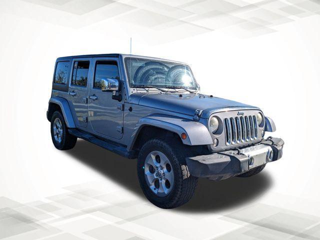 used 2014 Jeep Wrangler Unlimited car, priced at $18,899