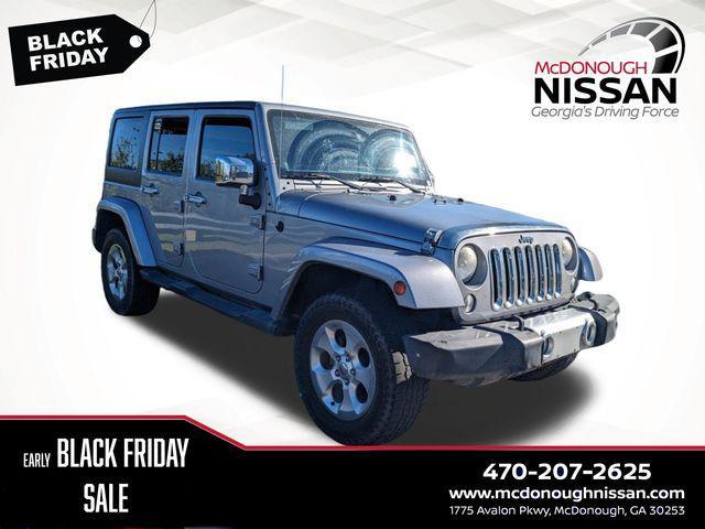 used 2014 Jeep Wrangler Unlimited car, priced at $18,899