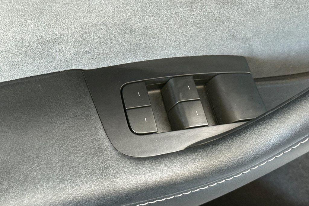 used 2024 Tesla Model Y car, priced at $34,990