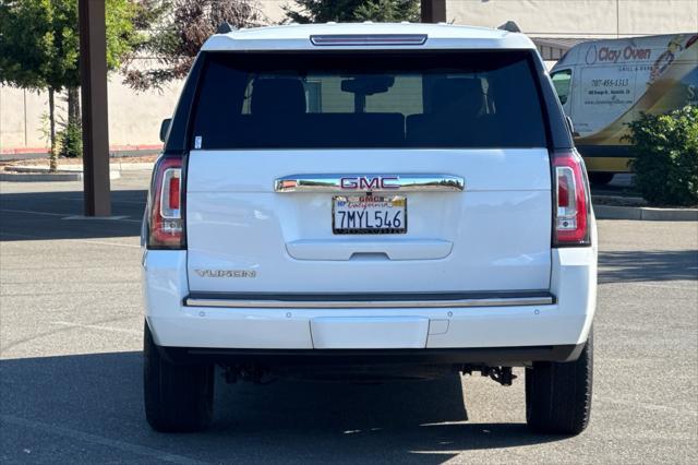 used 2015 GMC Yukon car, priced at $28,990