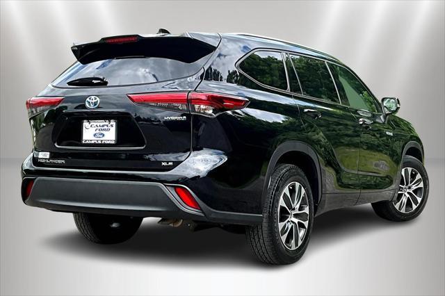 used 2021 Toyota Highlander Hybrid car, priced at $31,500