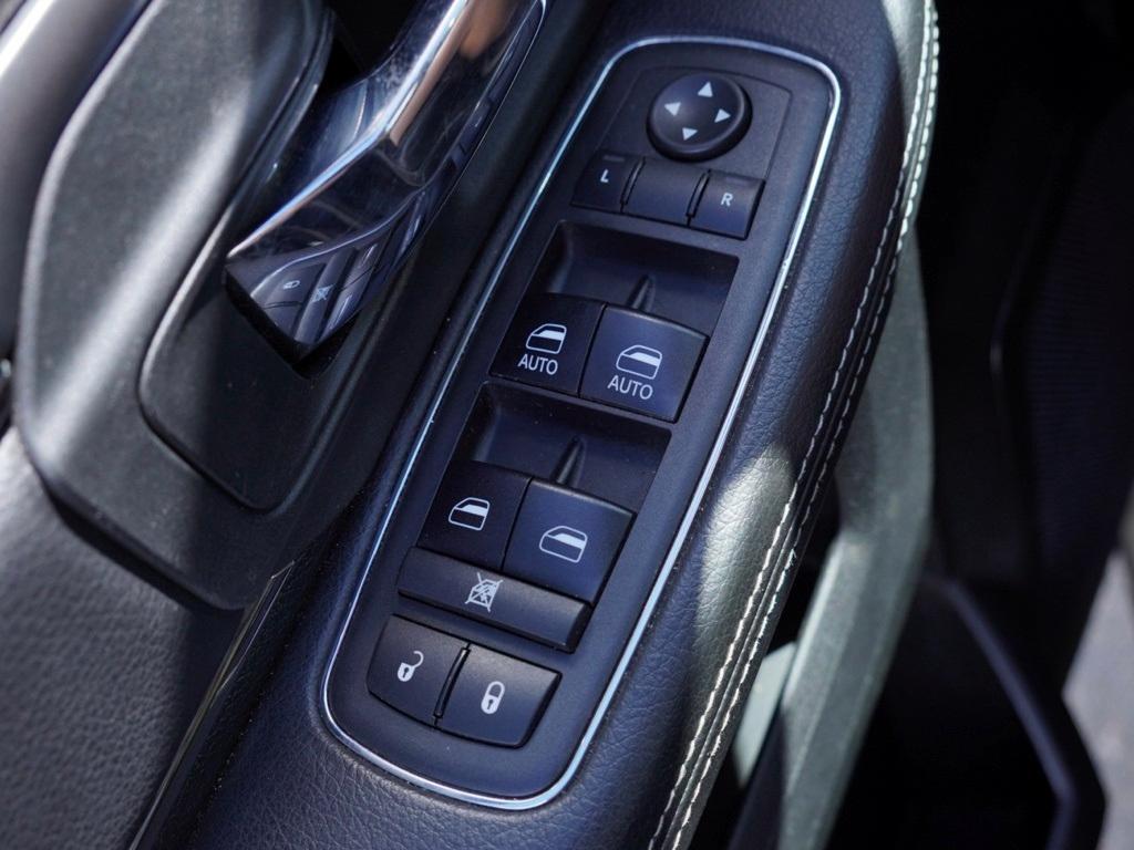 used 2018 Ram 1500 car, priced at $30,180