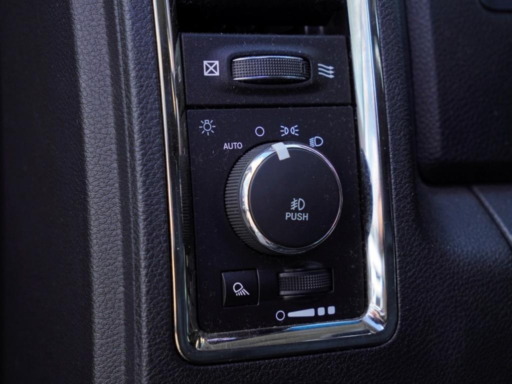 used 2018 Ram 1500 car, priced at $30,180