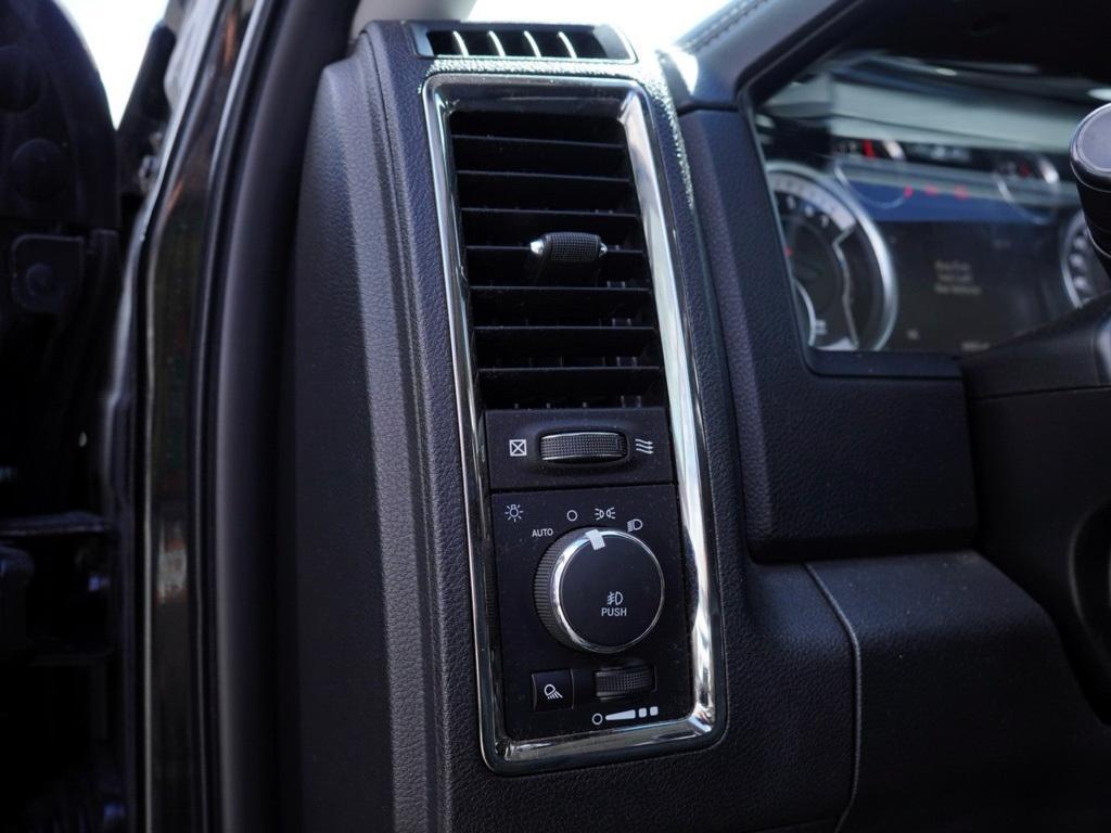 used 2018 Ram 1500 car, priced at $30,180