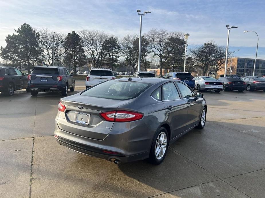 used 2014 Ford Fusion car, priced at $9,999