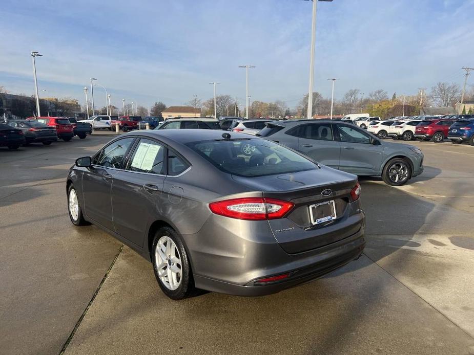 used 2014 Ford Fusion car, priced at $9,999