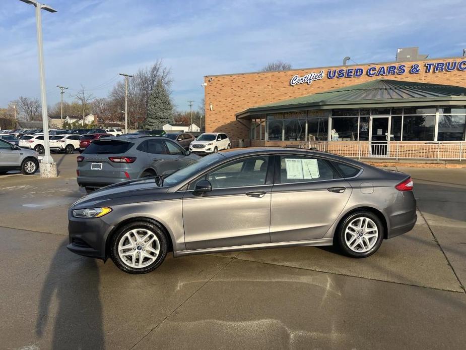 used 2014 Ford Fusion car, priced at $9,999