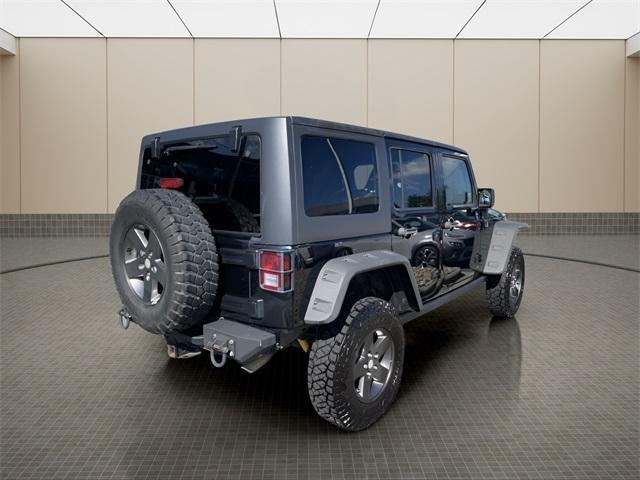 used 2011 Jeep Wrangler Unlimited car, priced at $15,500