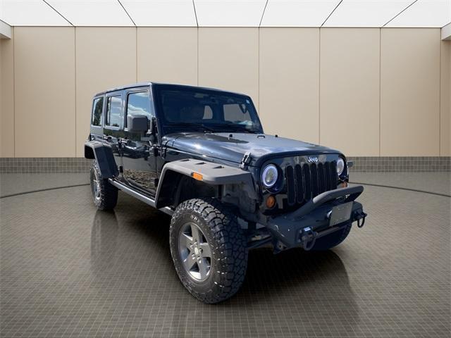 used 2011 Jeep Wrangler Unlimited car, priced at $15,500