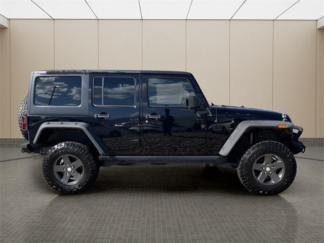used 2011 Jeep Wrangler Unlimited car, priced at $15,500