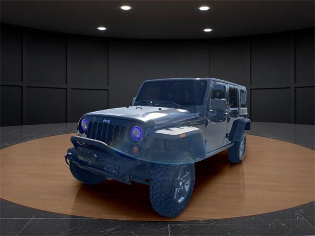used 2011 Jeep Wrangler Unlimited car, priced at $16,500