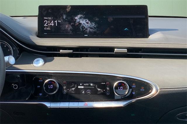 used 2025 Genesis GV70 car, priced at $54,750