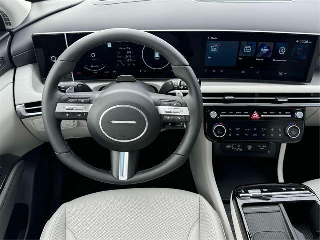 new 2025 Hyundai TUCSON Hybrid car, priced at $39,982