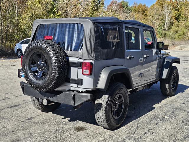 used 2014 Jeep Wrangler Unlimited car, priced at $17,987