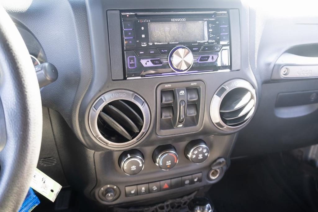 used 2012 Jeep Wrangler Unlimited car, priced at $15,250