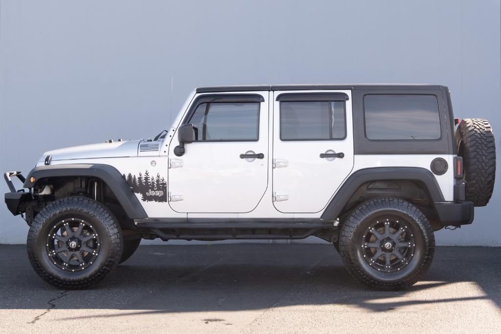 used 2012 Jeep Wrangler Unlimited car, priced at $15,250