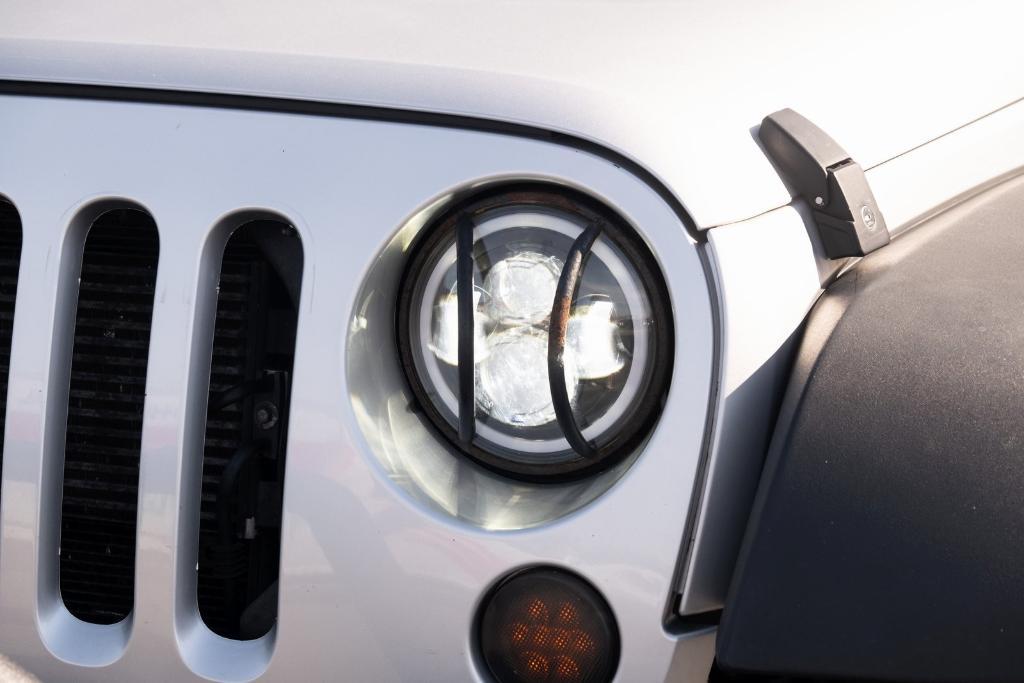 used 2012 Jeep Wrangler Unlimited car, priced at $15,250