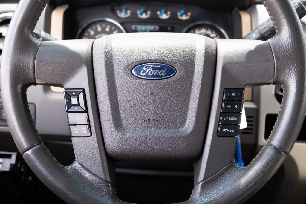 used 2014 Ford F-150 car, priced at $10,000