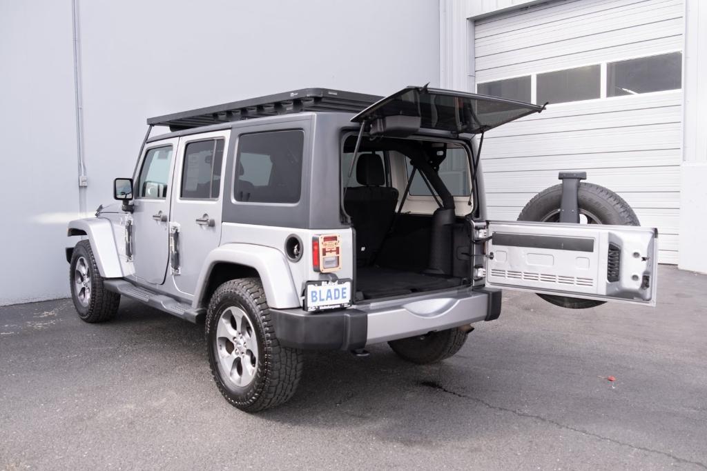 used 2016 Jeep Wrangler Unlimited car, priced at $15,899