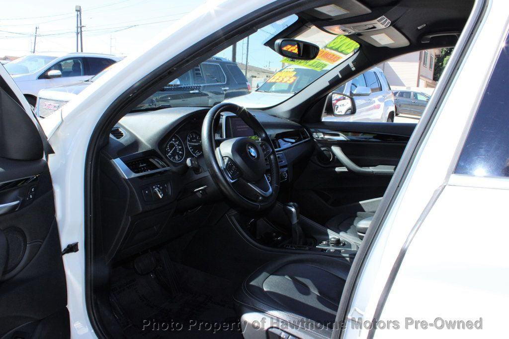 used 2018 BMW X1 car, priced at $13,595