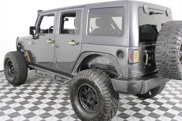 used 2014 Jeep Wrangler Unlimited car, priced at $15,995