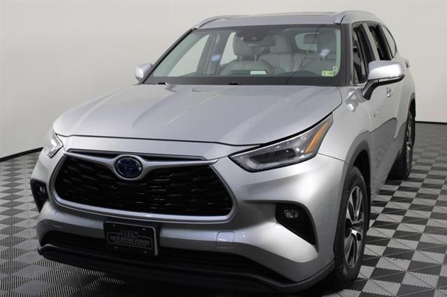 used 2021 Toyota Highlander Hybrid car, priced at $30,444
