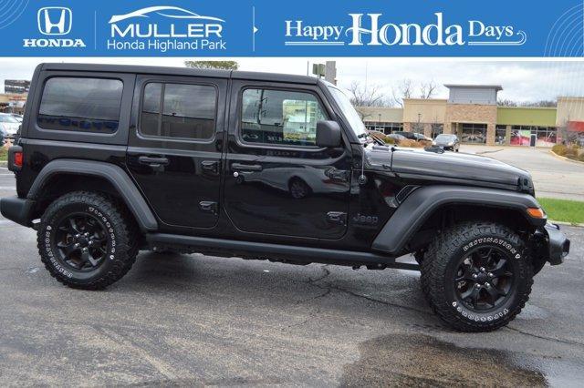 used 2021 Jeep Wrangler Unlimited car, priced at $33,894