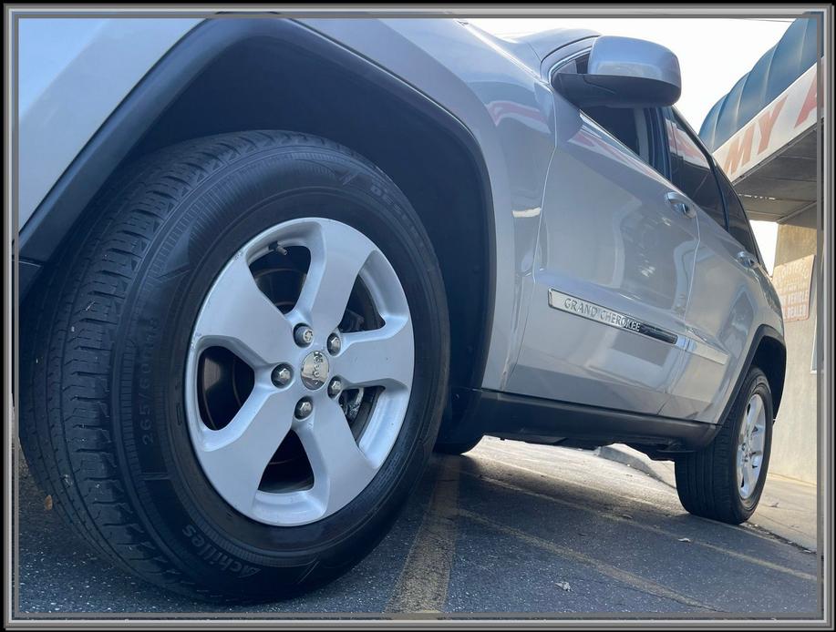 used 2011 Jeep Grand Cherokee car, priced at $11,999