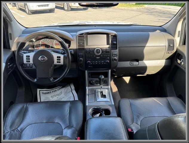 used 2009 Nissan Pathfinder car, priced at $10,499