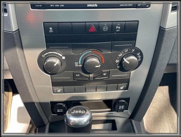 used 2010 Jeep Grand Cherokee car, priced at $10,499