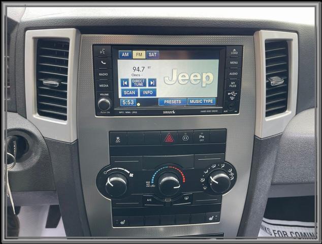 used 2010 Jeep Grand Cherokee car, priced at $11,999