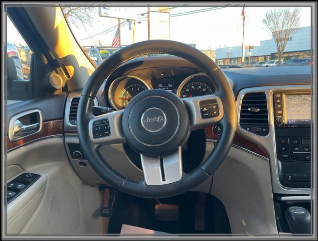 used 2011 Jeep Grand Cherokee car, priced at $12,999