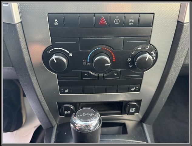 used 2010 Jeep Grand Cherokee car, priced at $11,999