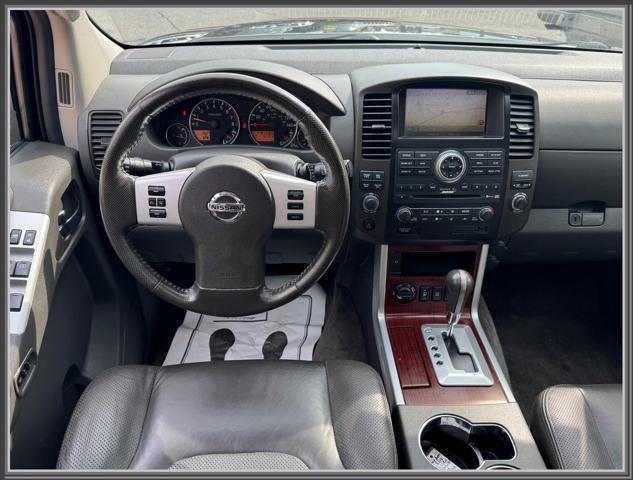 used 2010 Nissan Pathfinder car, priced at $11,999