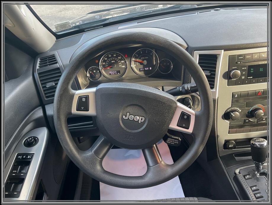 used 2010 Jeep Grand Cherokee car, priced at $9,999