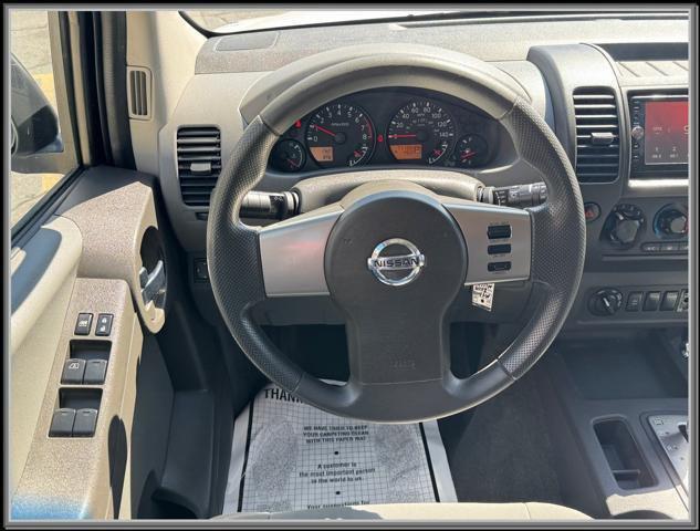 used 2009 Nissan Xterra car, priced at $9,999
