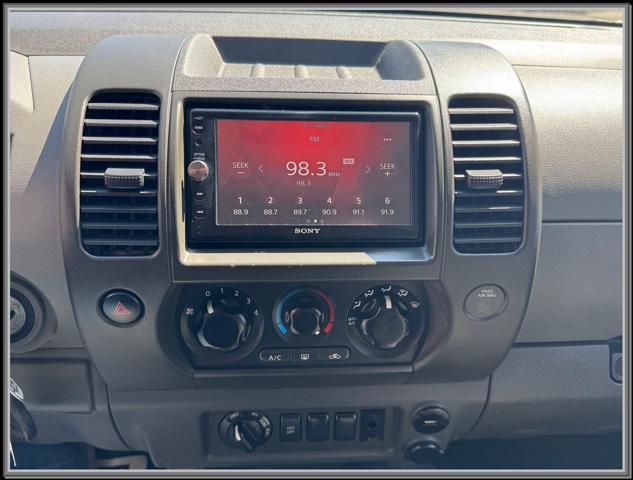 used 2009 Nissan Xterra car, priced at $9,999