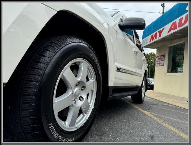 used 2010 Jeep Grand Cherokee car, priced at $10,999