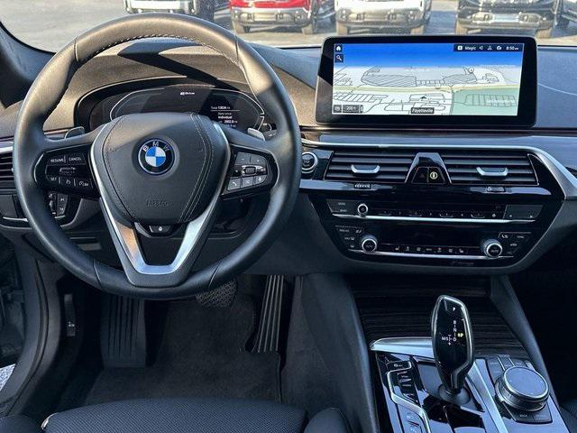 used 2023 BMW 530e car, priced at $40,620