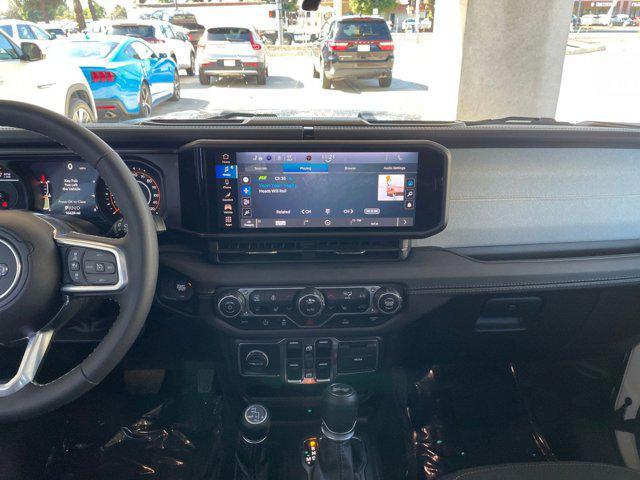 used 2025 Jeep Wrangler car, priced at $39,454