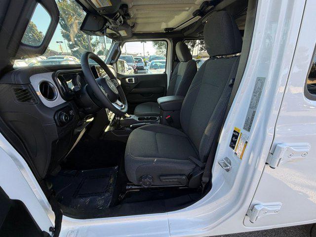 used 2025 Jeep Wrangler car, priced at $39,287