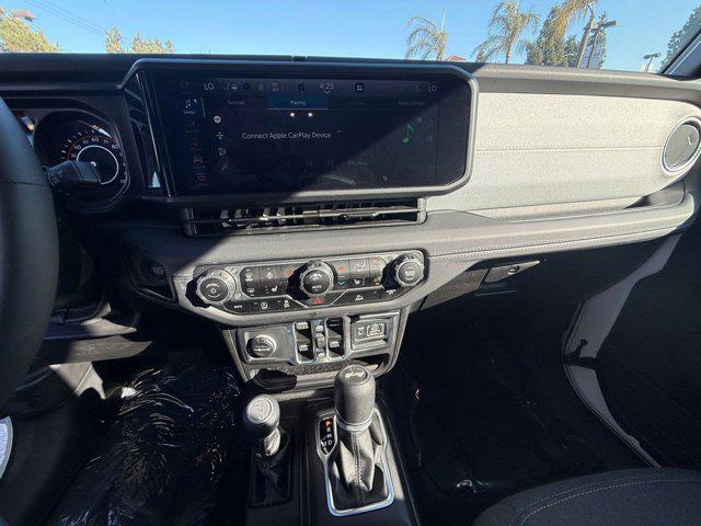 used 2025 Jeep Wrangler car, priced at $39,287