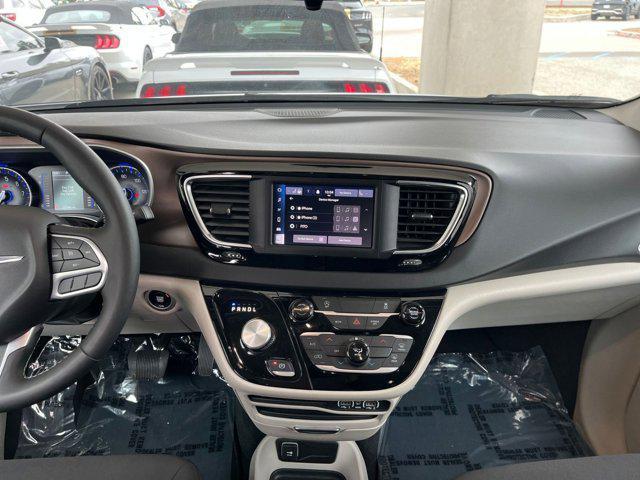 used 2024 Chrysler Voyager car, priced at $26,037