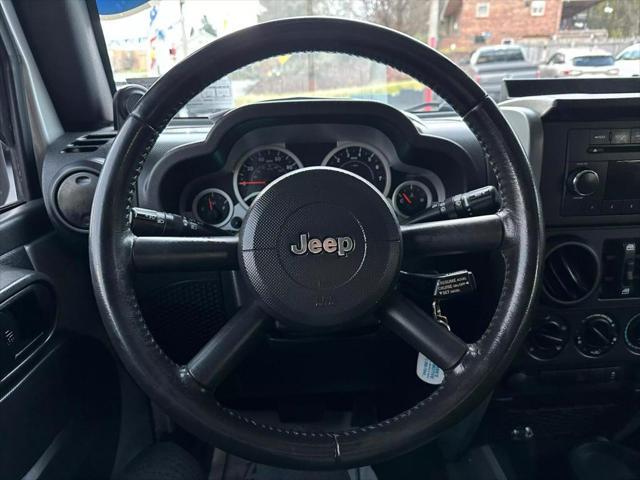 used 2010 Jeep Wrangler Unlimited car, priced at $13,995