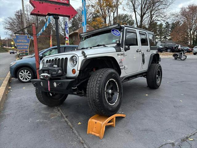 used 2010 Jeep Wrangler Unlimited car, priced at $13,995