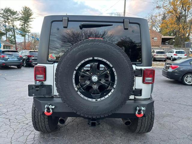 used 2010 Jeep Wrangler Unlimited car, priced at $13,995