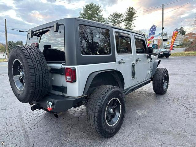 used 2010 Jeep Wrangler Unlimited car, priced at $13,995