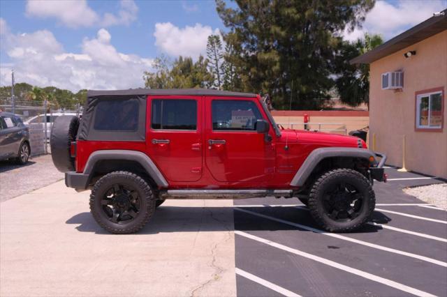 used 2014 Jeep Wrangler Unlimited car, priced at $12,988