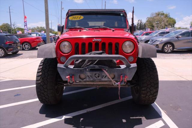 used 2014 Jeep Wrangler Unlimited car, priced at $12,988