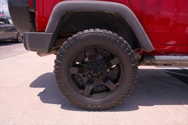 used 2014 Jeep Wrangler Unlimited car, priced at $12,988